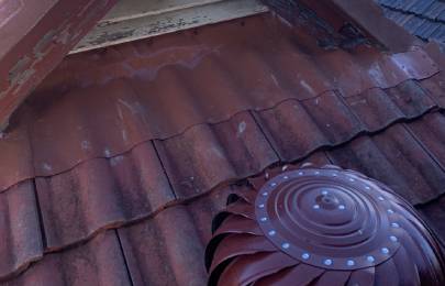 Metal & Tile Roof Repair and Maintenance image at Ivy Roofing contractor 2