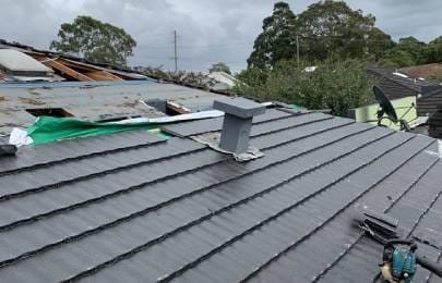 Metal & Tile Roof Repair and Maintenance image at Ivy Roofing contractor 1